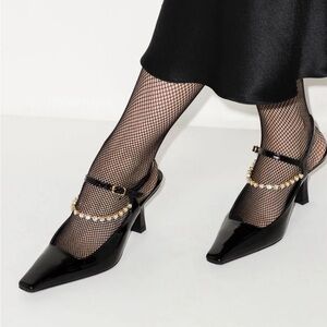 KHAITE Sidney patent leather pumps